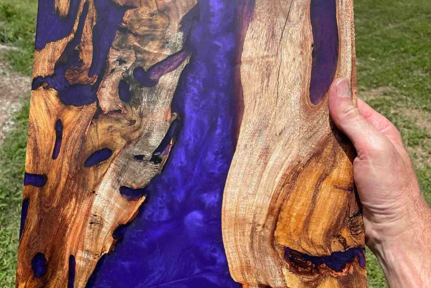 Blue epoxy serving board handcrafted by Metal Wood and Things for clients in Sutton and Gundaroo